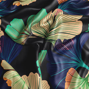 Ginkgo velvet by Tatie Lou in black, in soft folds showing oversized ginkgo leaves