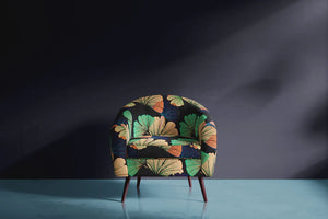 Ginkgo velvet by Tatie Lou in navy, oversized ginkgo leaves on an upholstered chair