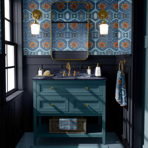 Nui Burst wallpaper by Tatie Lou in blue and orange, shibori-style bursts in a bathroom