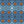 Nui Burst wallpaper by Tatie Lou in blue and orange, full repeat of shibori-style bursts