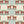 A Leopard Never Changes His Spots wallpaper by Annika Reed in orange and mint green, full repeat of leaping leopards