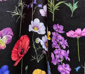 Botanica velvet by Victoria Sanders in black, in soft folds showing wildflowers and poppies