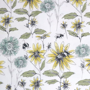 Bumblebee and Flora fabric by Seed Home Designs in yellow and green, full repeat of bumblebees and sunflowers