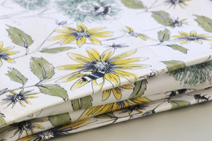 Bumblebee and Flora fabric by Seed Home Designs in yellow and green, pattern sample of bumblebees and sunflowers