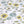 Bumblebee and Flora fabric by Seed Home Designs in yellow and green, pattern sample of bumblebees and sunflowers