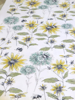 Bumblebee and Flora fabric by Seed Home Designs in yellow and green, pattern sample of bumblebees and sunflowers