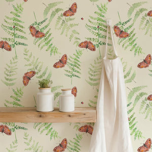 Sustainable Butterfly and wallpaper by Seed Home Designs in cream, butterflies and ferns above a sideboard