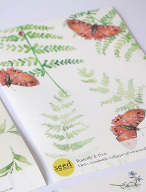 Sustainable Butterfly and wallpaper by Seed Home Designs in green, full repeat of butterflies and ferns