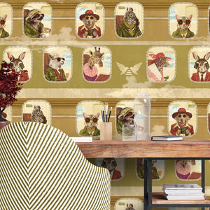 Cabin Class wallpaper by Brand McKenzie in green, animal passengers in train windows above a work desk