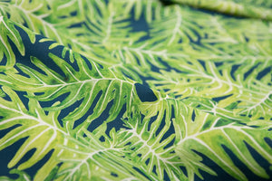 Canopy linen by Bethie Tricks in navy, in soft folds showing palm fronds