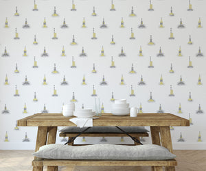 Cardinal wallpaper by XV Interiors in yellow, lighthouses and buoys in a bedroom