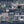 Catwalk wallpaper by Brand McKenzie in blue, detail of animals parading down a city street