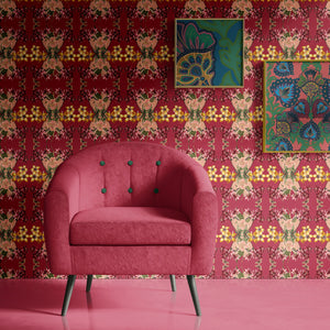 Hampi wallpaper by Tatie Lou in red, tropical flowers in a mirrored print in a living room