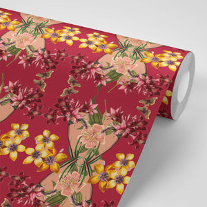 Hampi wallpaper by Tatie Lou in red, roll showing tropical flowers in a mirrored print