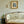 Chintz 21 linen by Parker and Jules in cream and red, a chintz of birds and flowers in a living room