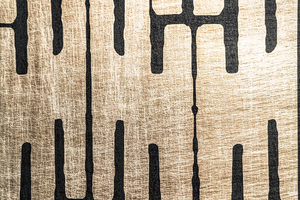 Structured Chaos wallpaper by Dami and Em Design in black and gold, draped, showing a geometric design