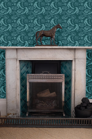 Chattering of Choughs wallpaper by Annika Reed in teal, choughs among leaves around a fireplace