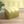 Citrus Collection Eco velvet by Liberty James Studio in yellow and white, wide stripes upholstered on a fringed footstool