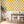 Clementine wallpaper by Seed Home Designs in blue, clementine slices in a dining area