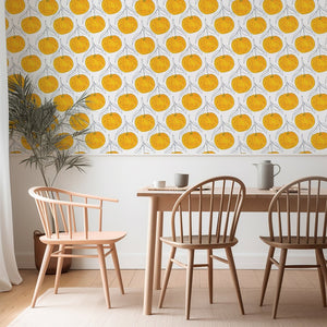 Clementine wallpaper by Seed Home Designs in blue, clementine slices in a dining area