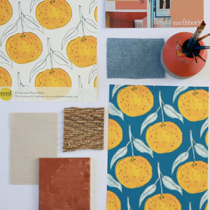Clementine wallpaper by Seed Home Designs in blue, flat sample of clementine slices