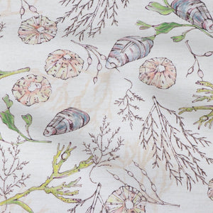 Coastal Cove fabric by Seed Home Designs in beige, flat sample of line-drawn shells and seaweed