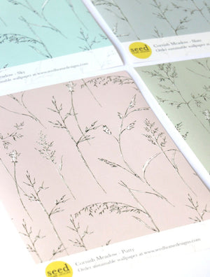 Cornish Meadow wallpaper by Seed Home Designs in beige, sample roll showing fine meadow grasses