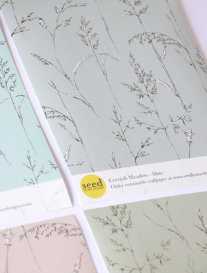 Cornish Meadow wallpaper by Seed Home Designs in grey, roll showing fine meadow grasses