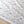 Coastal Cove fabric by Seed Home Designs in beige, pattern sample of line-drawn shells and seaweed