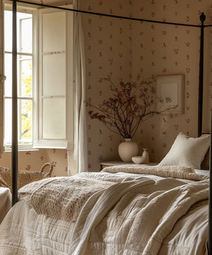 Cottage Ditsy wallpaper by Studio Le Cocq in burgundy, scattered ditsy flowers in a bedroom