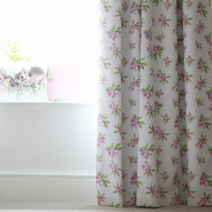Crab Apple Blossom fabric by Seed Home Designs in pink and green, crab apple blossom sprigs hung as curtains