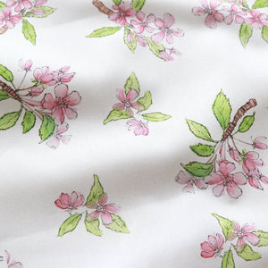 Crab Apple Blossom fabric by Seed Home Designs in pink and green, full repeat of crab apple blossom sprigs