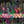 Creature Club wallpaper by Brand McKenzie in grey and black, detail of animals on a checkerboard stage