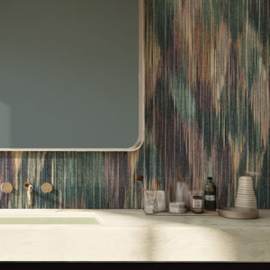 Spectre Ikat wallpaper by Victoria Sanders in red, a blurred ikat design in a bathroom