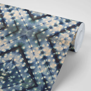 Indigo Itajime wallpaper by Tatie Lou in blue, roll showing itajime shibori folds