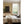 Cross Stitch wallpaper by Annika Reed in orange and red, cross-stitch motifs in a bedroom