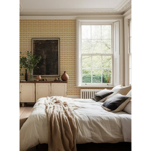 Cross Stitch wallpaper by Annika Reed in orange and red, cross-stitch motifs in a bedroom
