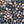 Charlotte Curate Space wallpaper in midnight blue, full repeat of hand-painted seashells and starfish