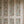 Freya wallpaper by Curate Space in off-white, loose painterly flowers and leaves in a room with built-in cupboards