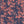 Mina wallpaper by Curate Space in rouge red, full repeat of dramatic layered florals and foliage