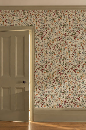 Nola wallpaper by Curate Space in off-white, wildflowers and tall stems in a hallway beside a panelled door