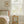 Dance Away With the Fairies wallpaper by Annika Reed in cream and green, fairies in rows behind a bed