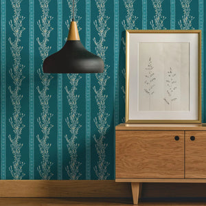 Gatty's Kelp Forest wallpaper by Annika Reed in teal, kelp fronds above a sideboard