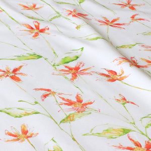 Dancing Autumn Daisies linen by Seed Home Designs in orange and green, full repeat (alternate view)