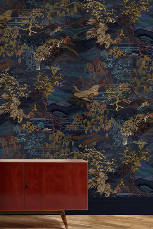 Dream Catcher wallpaper by Victoria Sanders in indigo, a dreamlike toile of birds and foliage behind a console table