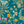 Eden wallpaper by Deus ex Gardenia in teal, close view of lush leaves and fruit
