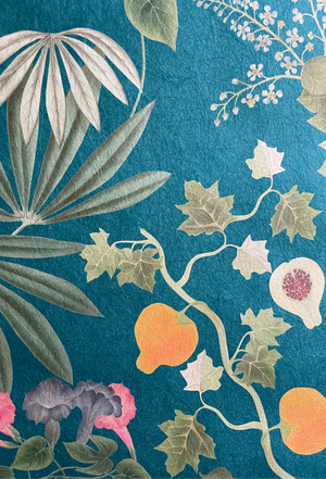 Eden wallpaper by Deus ex Gardenia in teal, detail of lush leaves and fruit