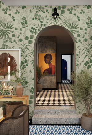 Eden wallpaper by Deus ex Gardenia in cream and green, lush leaves and fruit in a hallway
