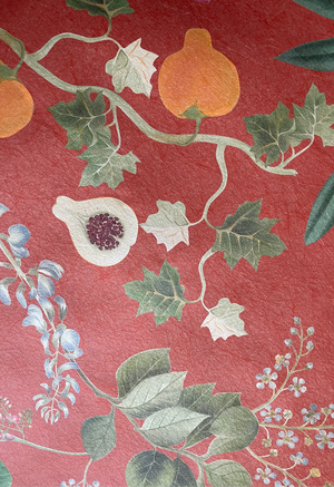 Eden wallpaper by Deus ex Gardenia in orange, flat sample of lush leaves and fruit