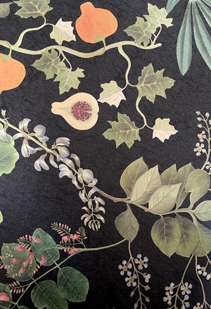 Eden wallpaper by Deus ex Gardenia in black, full repeat of lush leaves and fruit